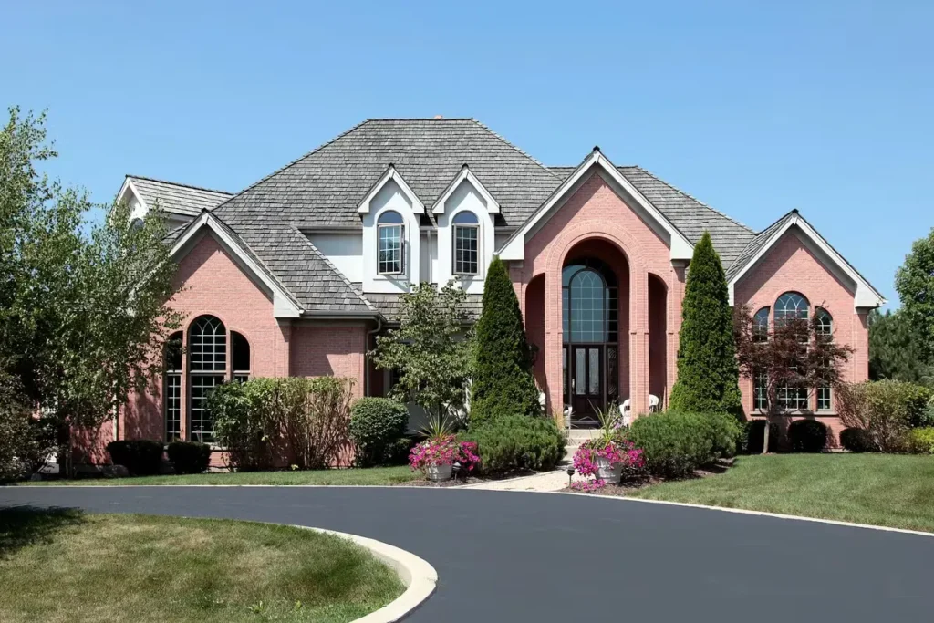 front curb view of new roof installation with composite roofing materials