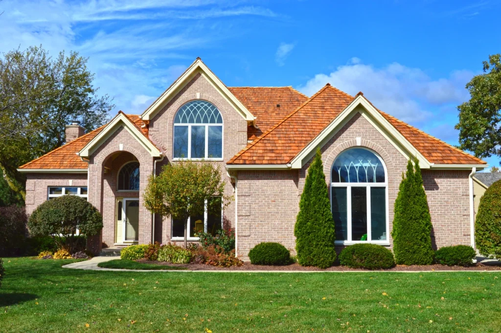 exterior of house with new cedar roof
