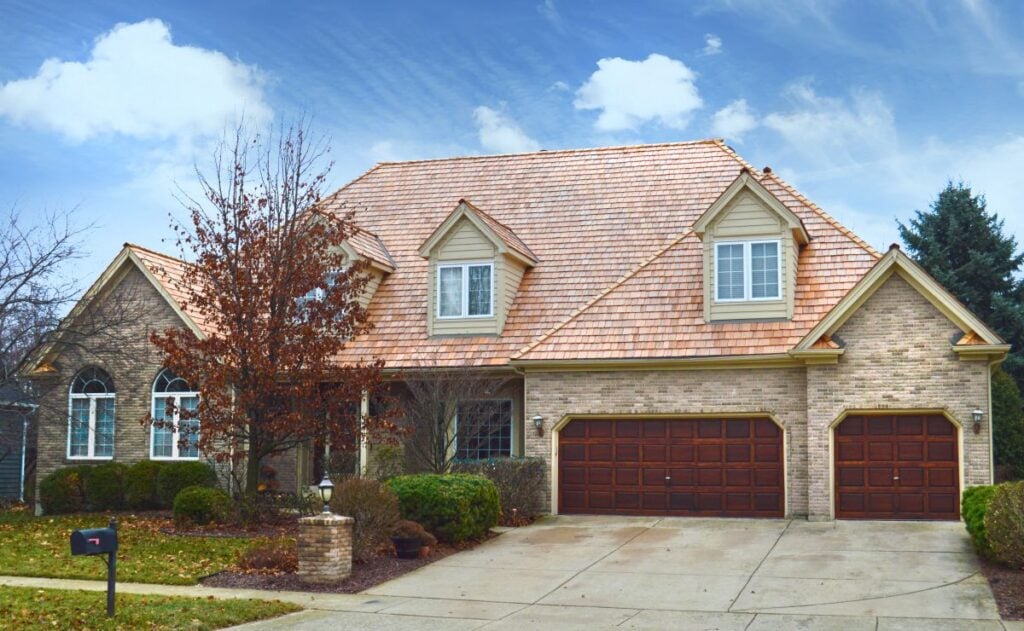 Large house with a cedar shake roof