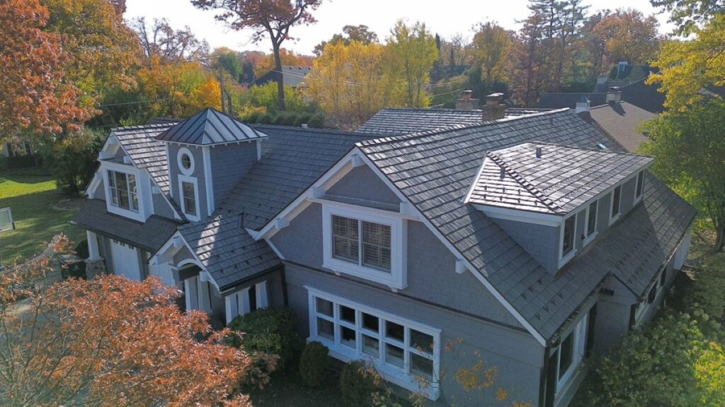 weatherproof house with fall foliage in the background