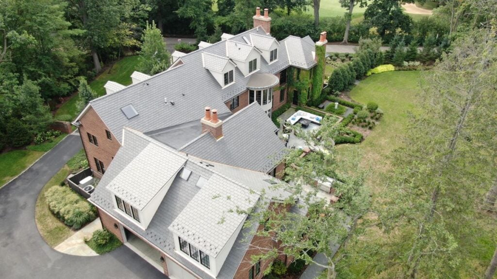 Large house with a light grey slate roof