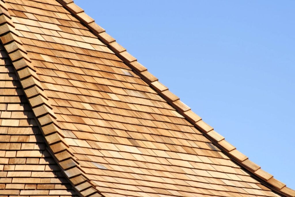 cedar shake roof against blue sky