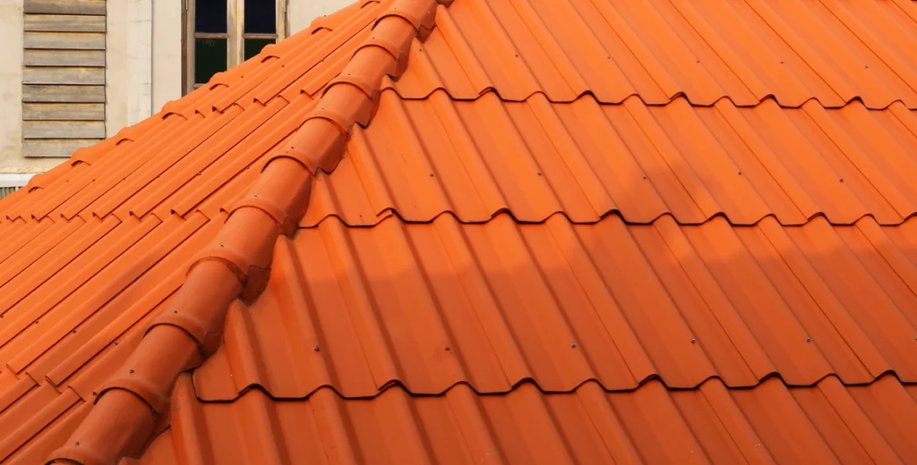 close up view of flat roof tiles installed on home