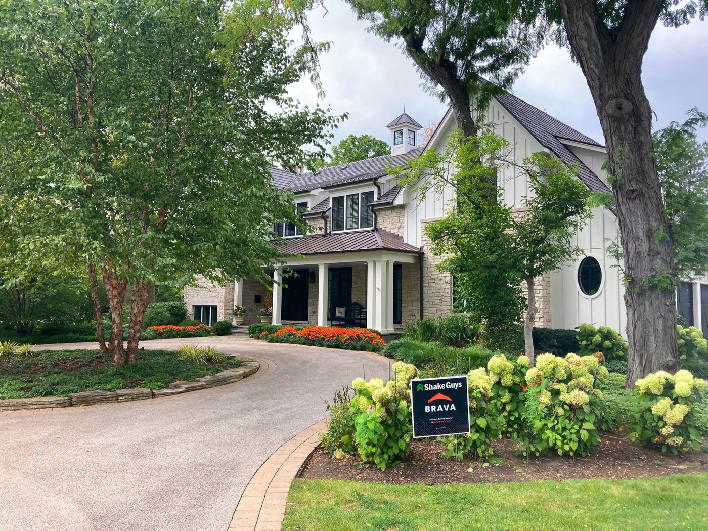 view of beautiful home in illinois curb view of brava composite shake roofing installation