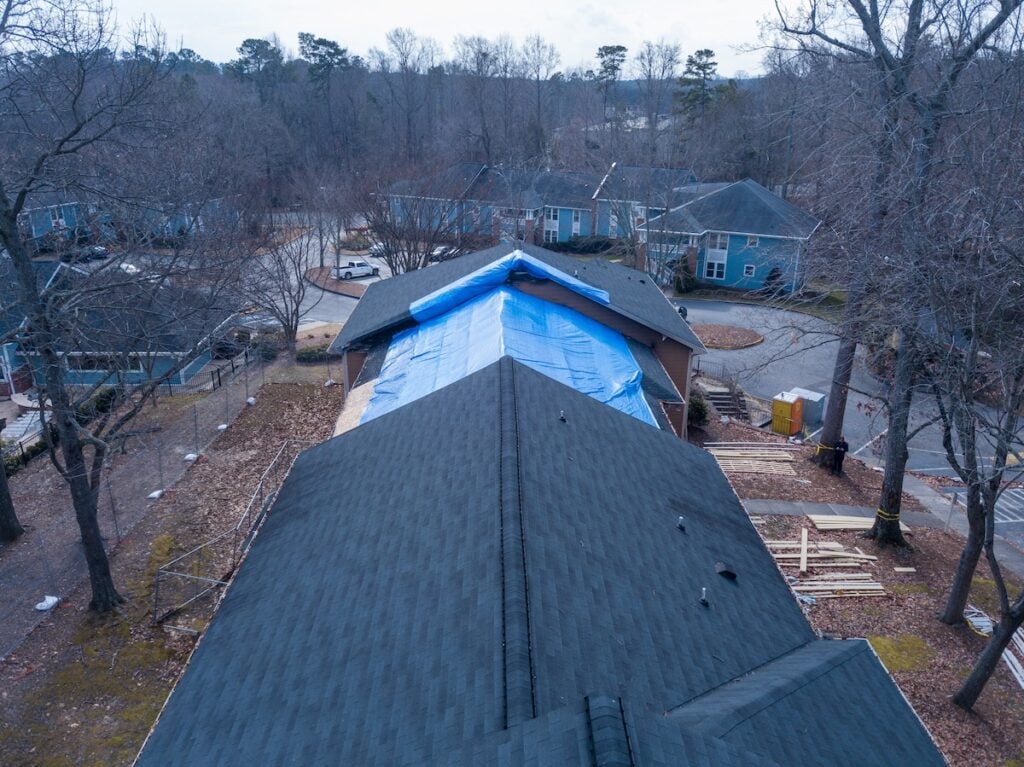 tarp on apartment building