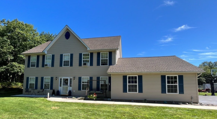 new shingle roof installation with asphalt shingles