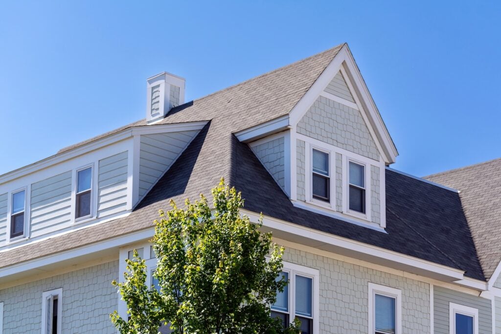 newly installed composite shingles on roof