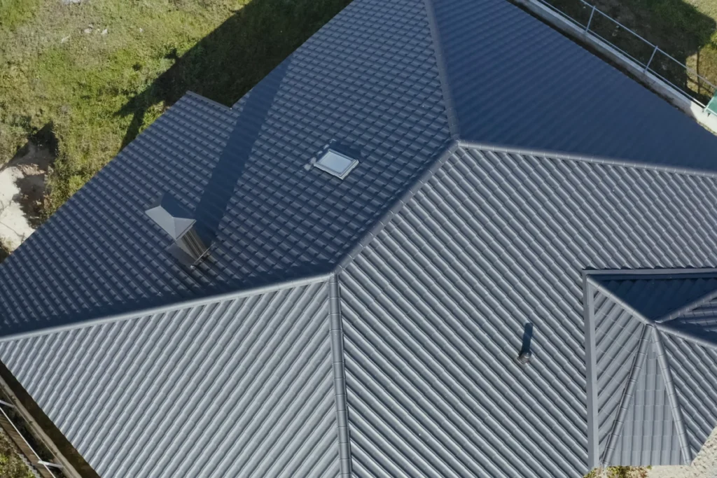 downward aerial view of steel metal panels to mimic shingles